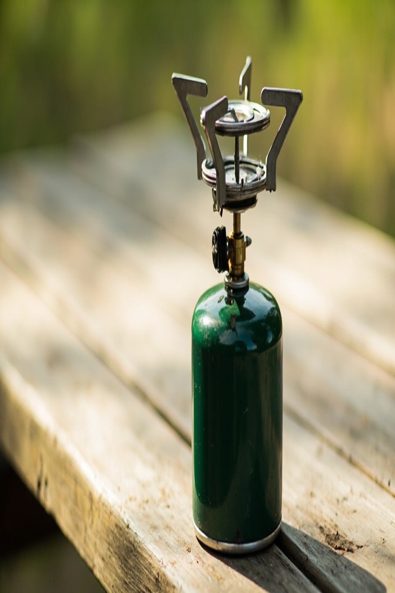 Coleman Bottletop Propane Stove screwed directly onto a 1-lb green propane canister